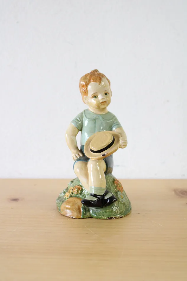 Jubilee Thrift Necklaces 1957 Boy Sitting With Hat Ceramic Figurine